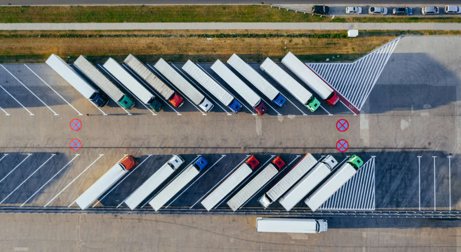 logistics communication translation, trucks parked in a line