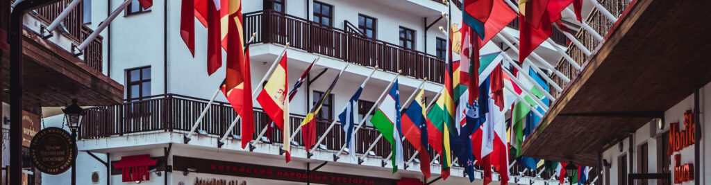 Flags hanging by hotel